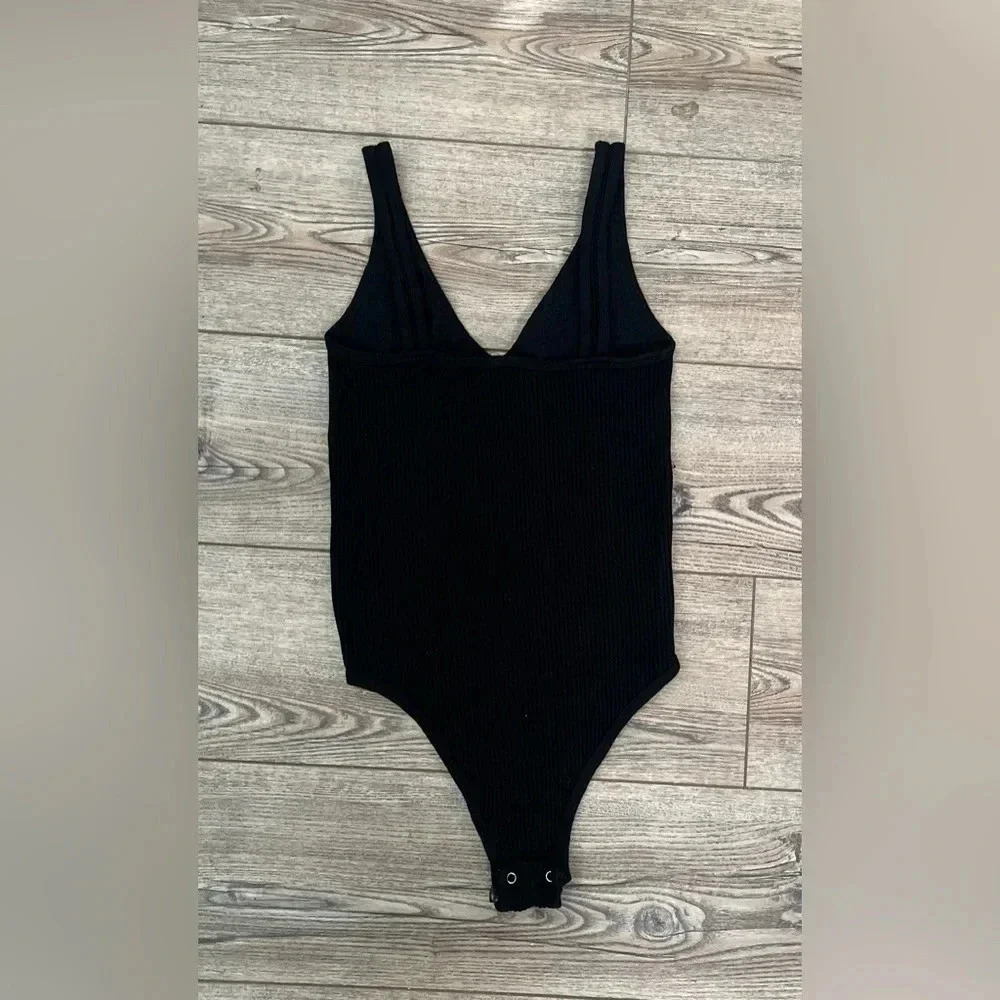 Aura free people black bodysuit